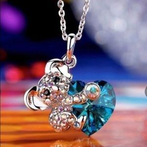 Koala Holding A Blue Crystal Heart Pendant necklace